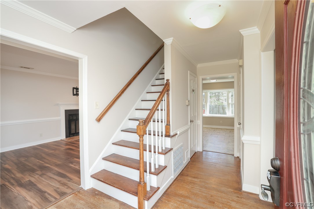 13802 Garrison Pl Drive Midlothian, VA 23112 - Photo 5 of 47 a view of a hallway with wooden floor and entryway