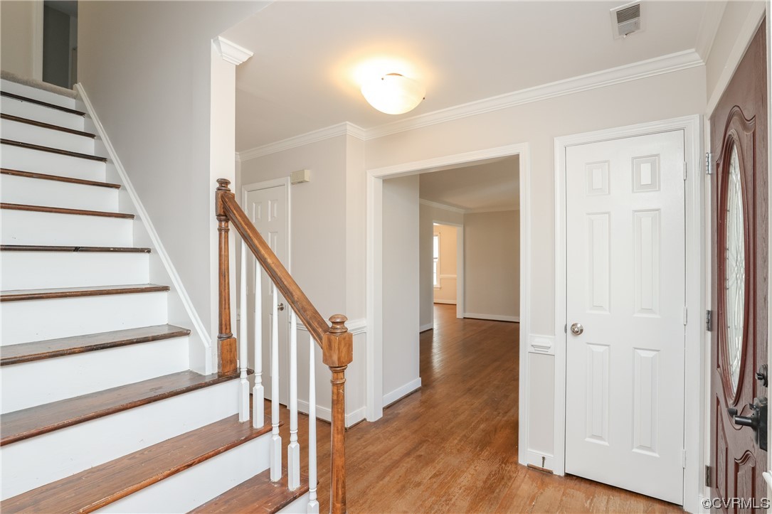 13802 Garrison Pl Drive Midlothian, VA 23112 - Photo 6 of 47 a view of a hallway with wooden floor and entryway