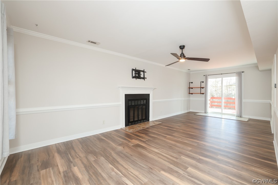 13802 Garrison Pl Drive Midlothian, VA 23112 - Photo 7 of 47 a view of empty room with wooden floor and fan