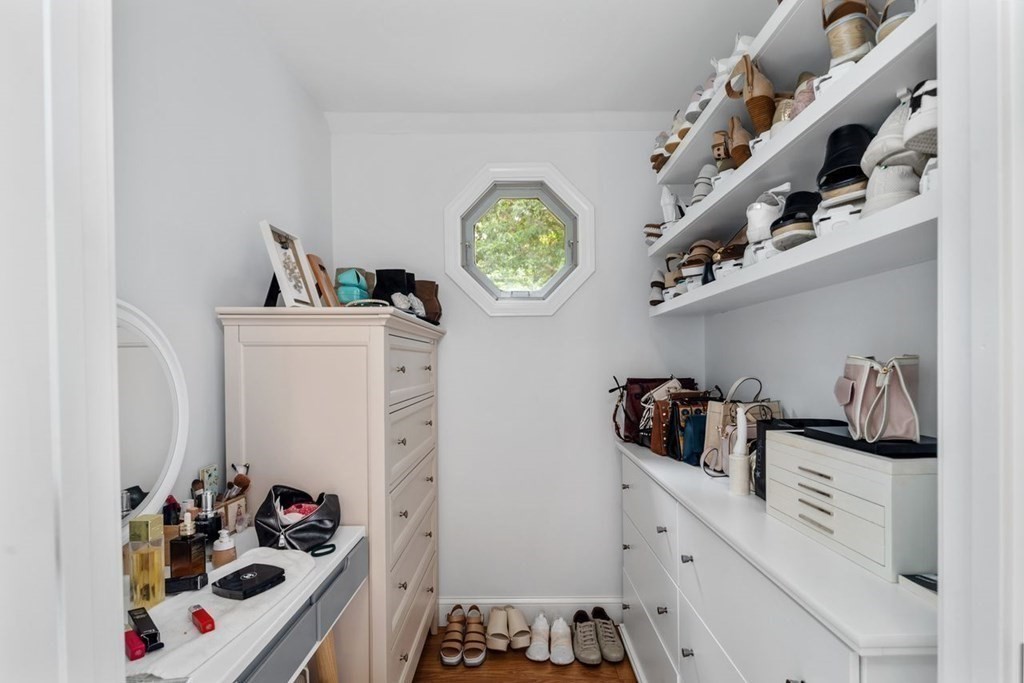 155 Whiting Street Hingham, MA 02043 - Photo 14 of 30 a kitchen with a refrigerator and a stove top oven
