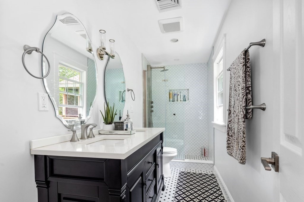 155 Whiting Street Hingham, MA 02043 - Photo 15 of 30 a bathroom with a sink a toilet and shower