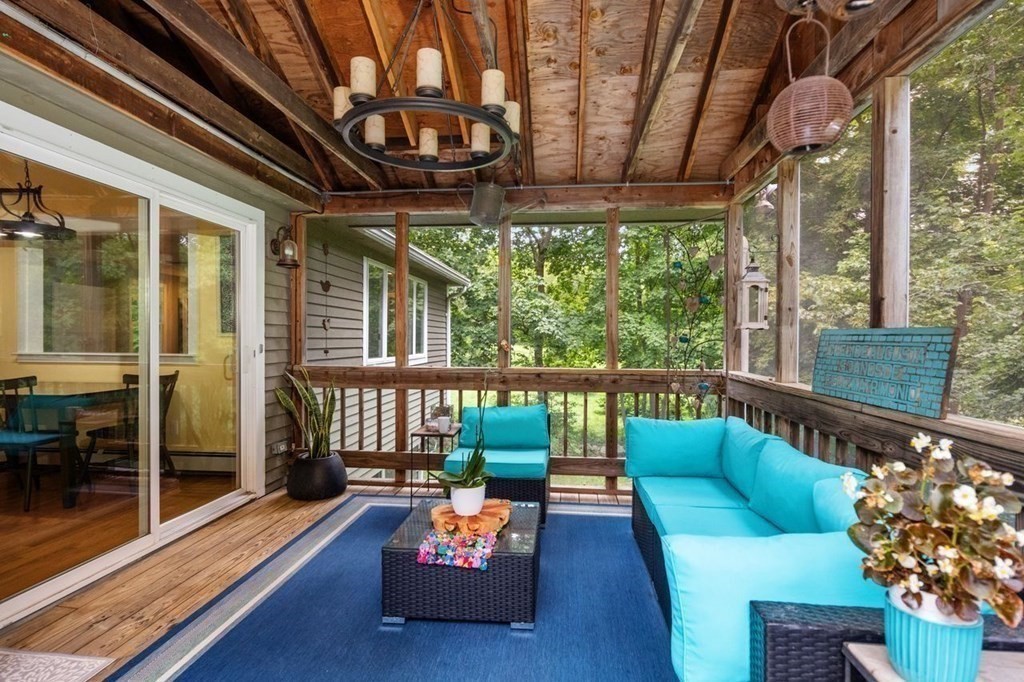 155 Whiting Street Hingham, MA 02043 - Photo 21 of 30 a balcony with furniture and a potted plant