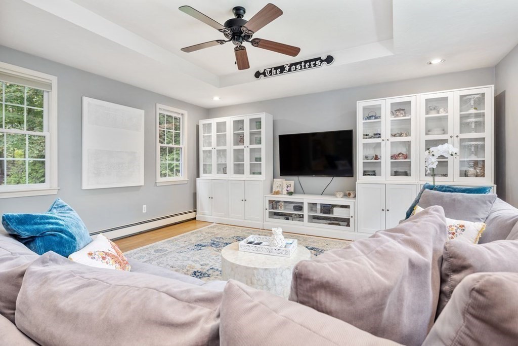 155 Whiting Street Hingham, MA 02043 - Photo 10 of 30 a living room with furniture and a flat screen tv