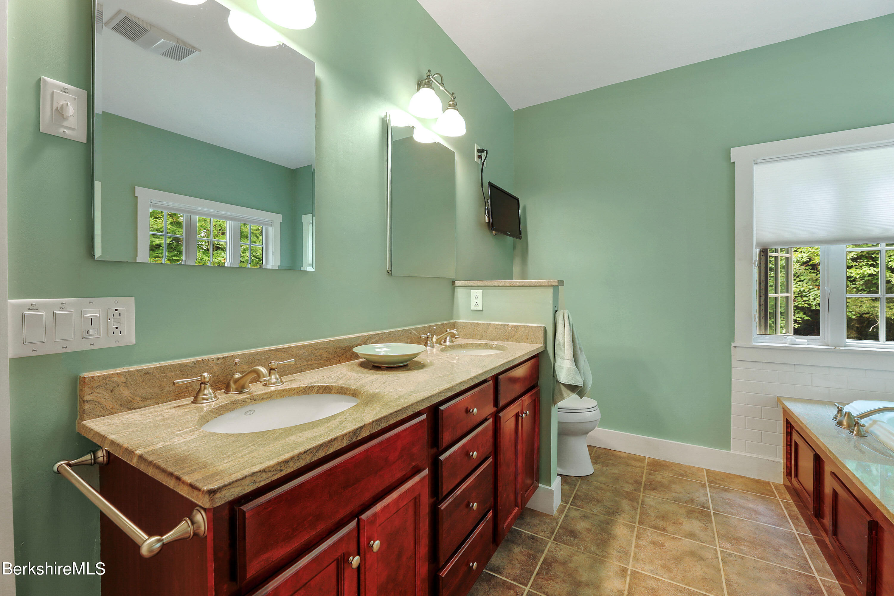 12 Castle Hill Road Stockbridge, MA 01262 - Photo 17 of 39 a bathroom with a sink and a mirror