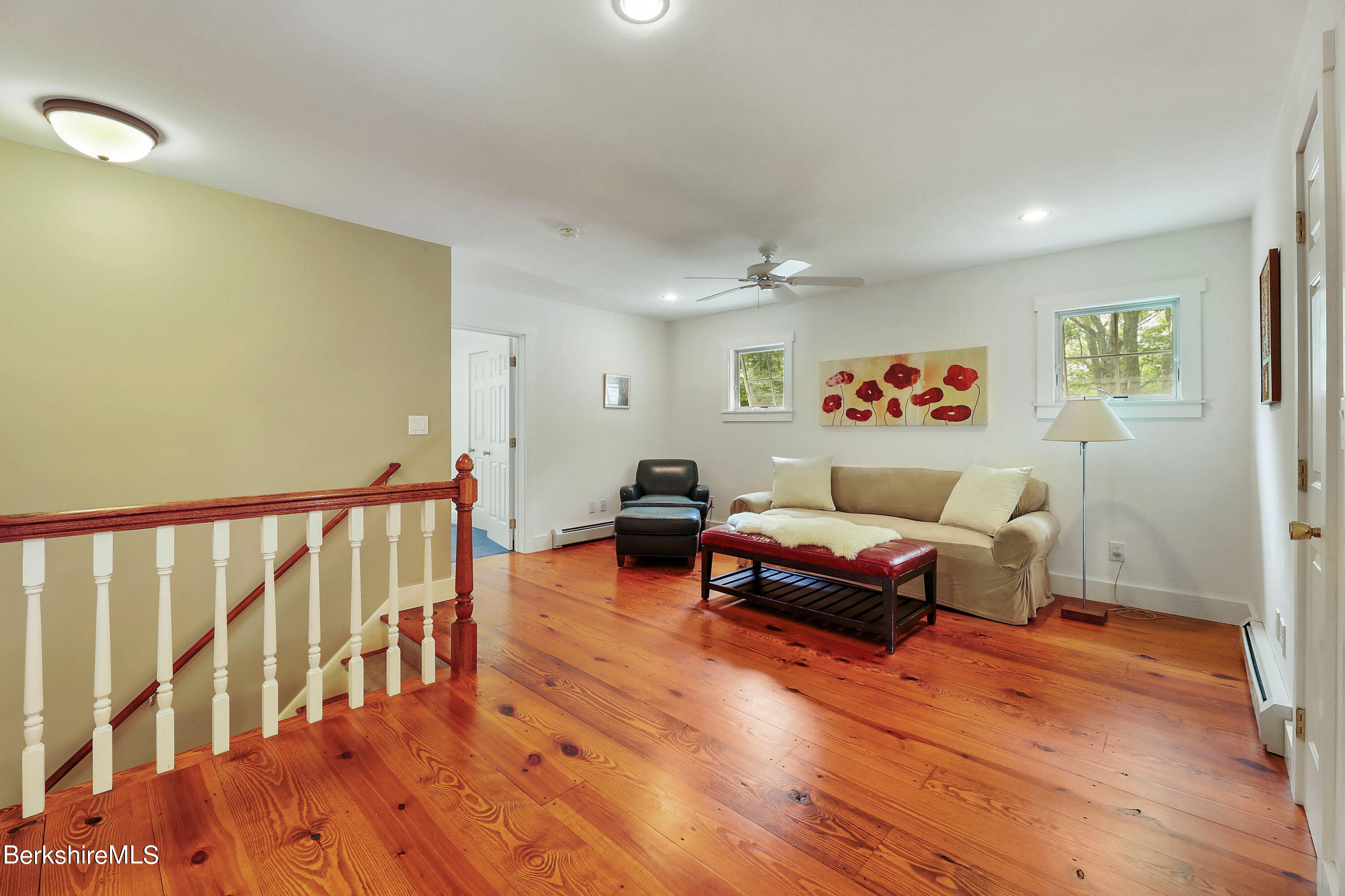 12 Castle Hill Road Stockbridge, MA 01262 - Photo 21 of 39 a living room with furniture and a wooden floor