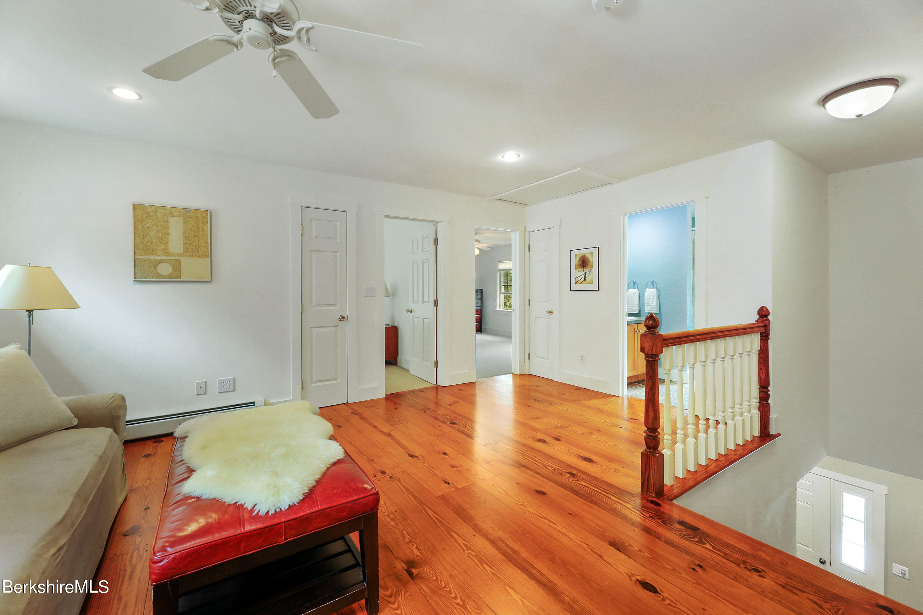 12 Castle Hill Road Stockbridge, MA 01262 - Photo 22 of 39 a bed room with a bed and a chair