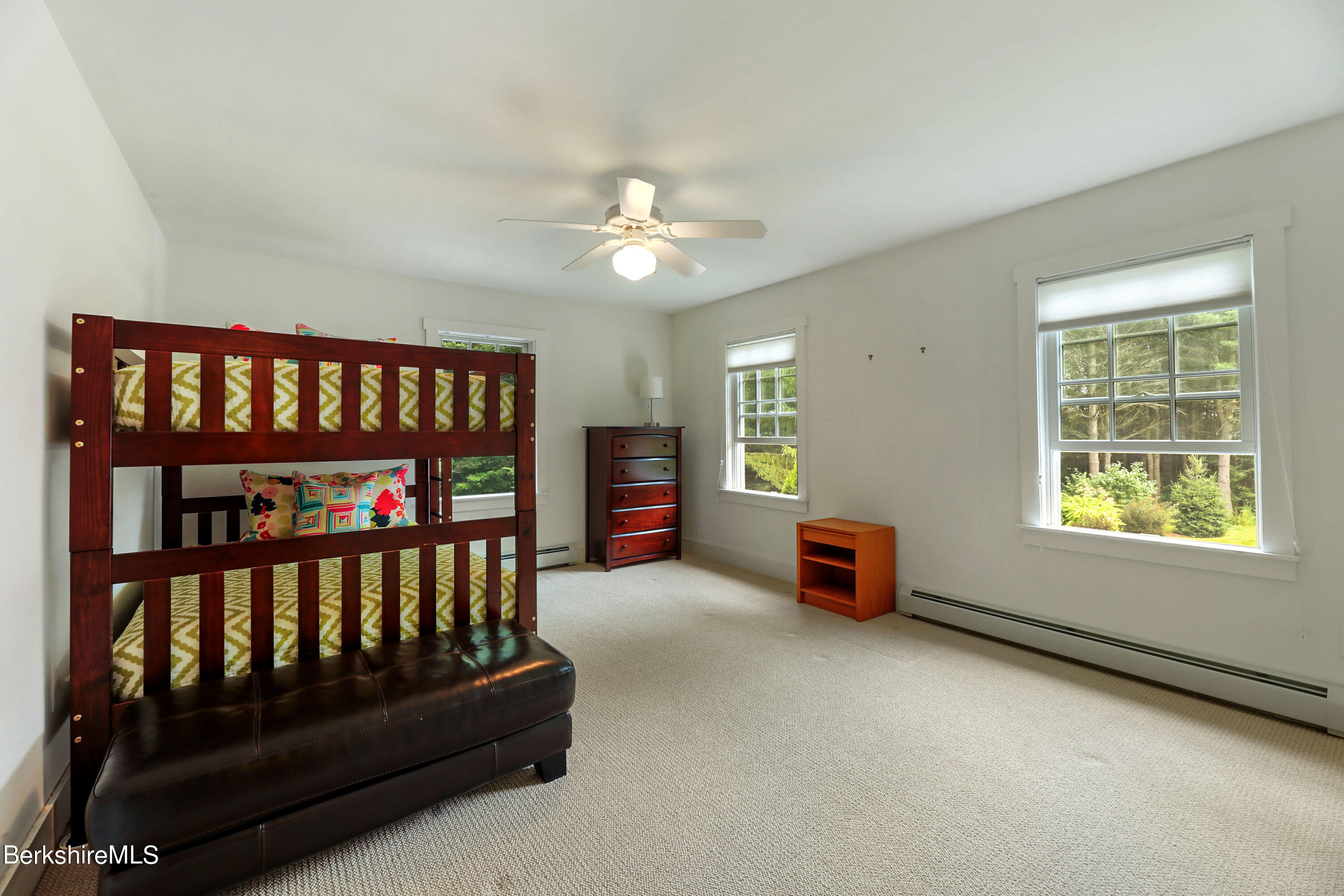 12 Castle Hill Road Stockbridge, MA 01262 - Photo 28 of 39 a bedroom with furniture and a book shelf