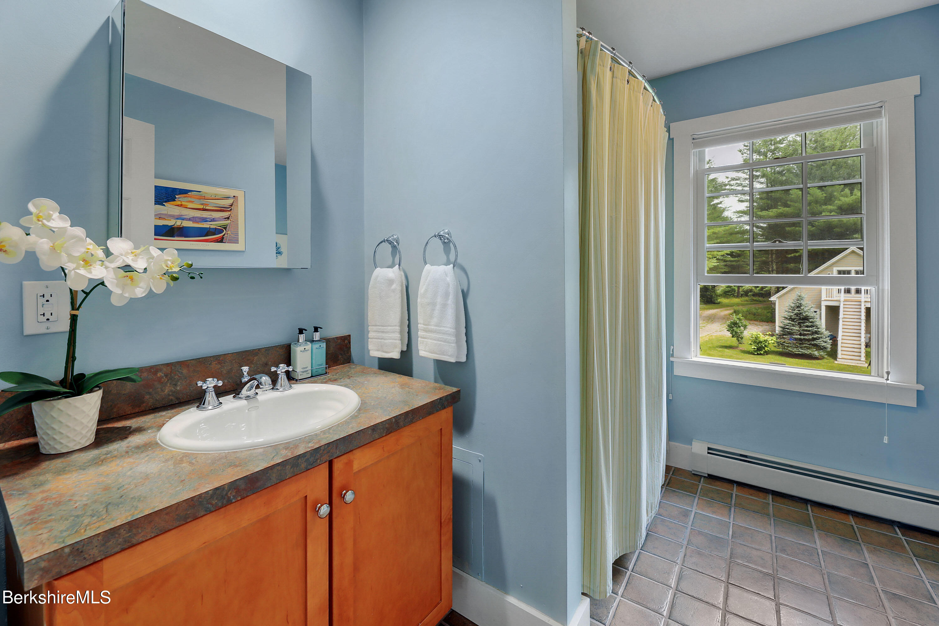 12 Castle Hill Road Stockbridge, MA 01262 - Photo 30 of 39 a bathroom with a sink and a mirror