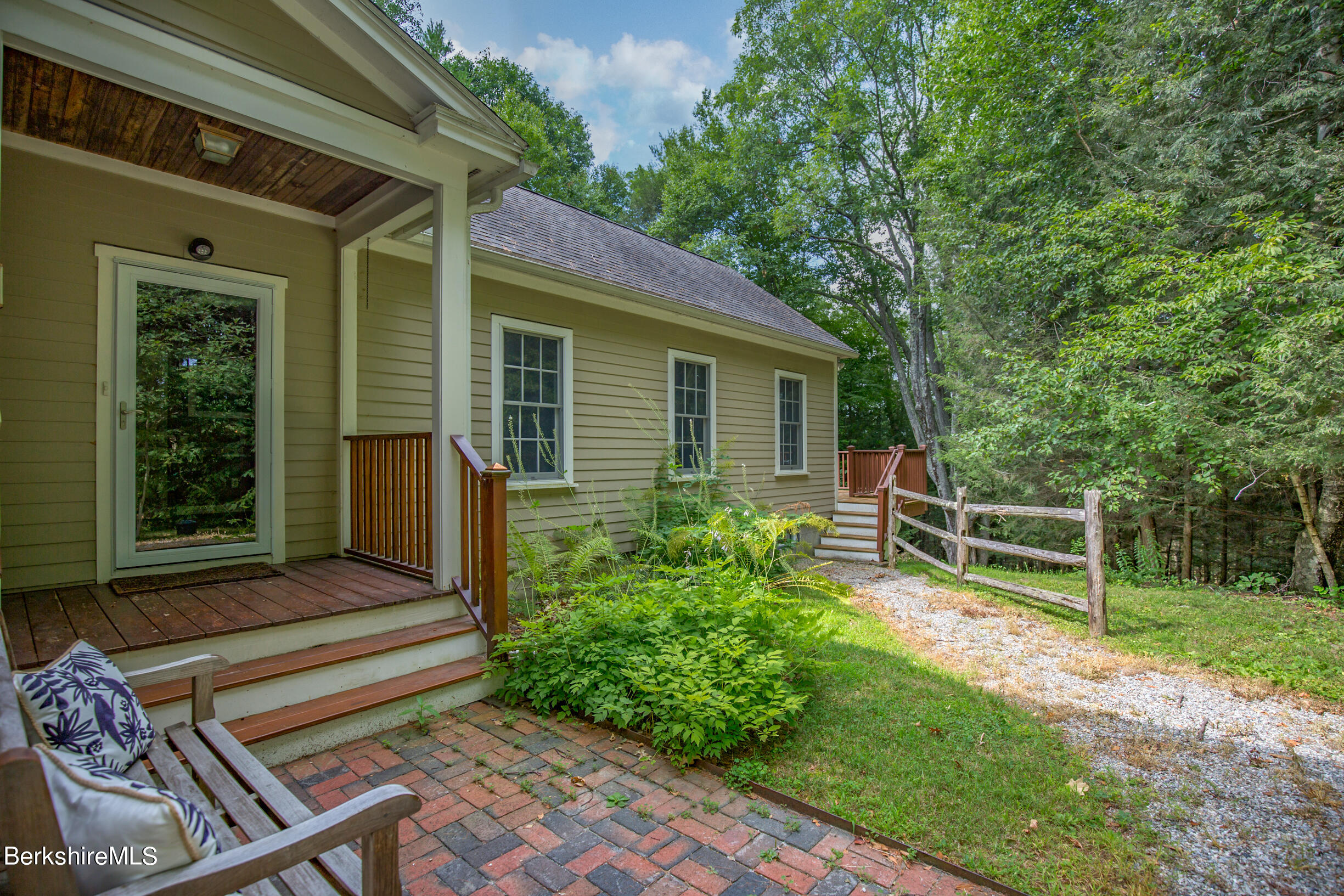 12 Castle Hill Road Stockbridge, MA 01262 - Photo 3 of 39 a front view of a house with garden