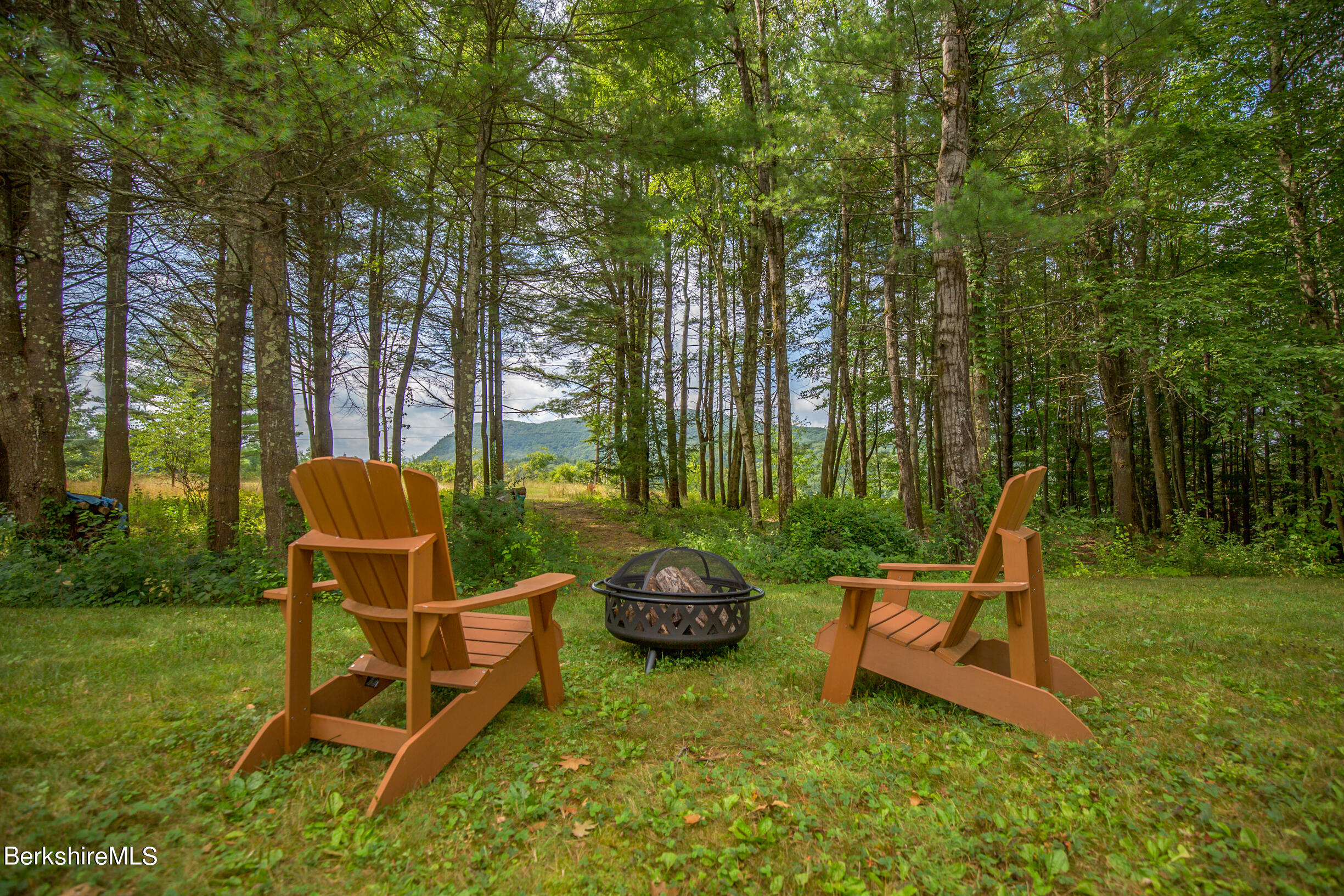 12 Castle Hill Road Stockbridge, MA 01262 - Photo 36 of 39 a garden view with a seating space