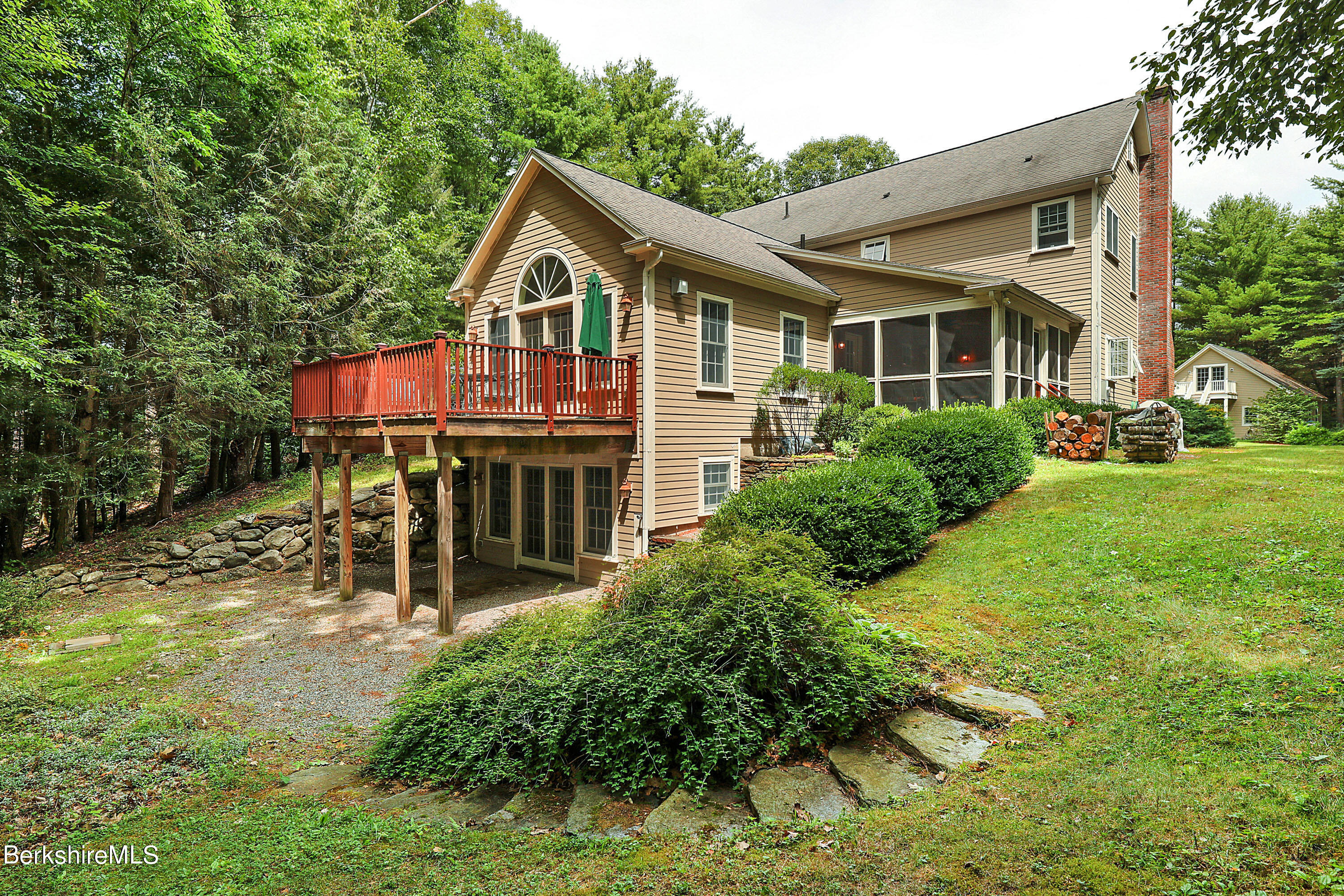 12 Castle Hill Road Stockbridge, MA 01262 - Photo 4 of 39 a front view of a house with garden