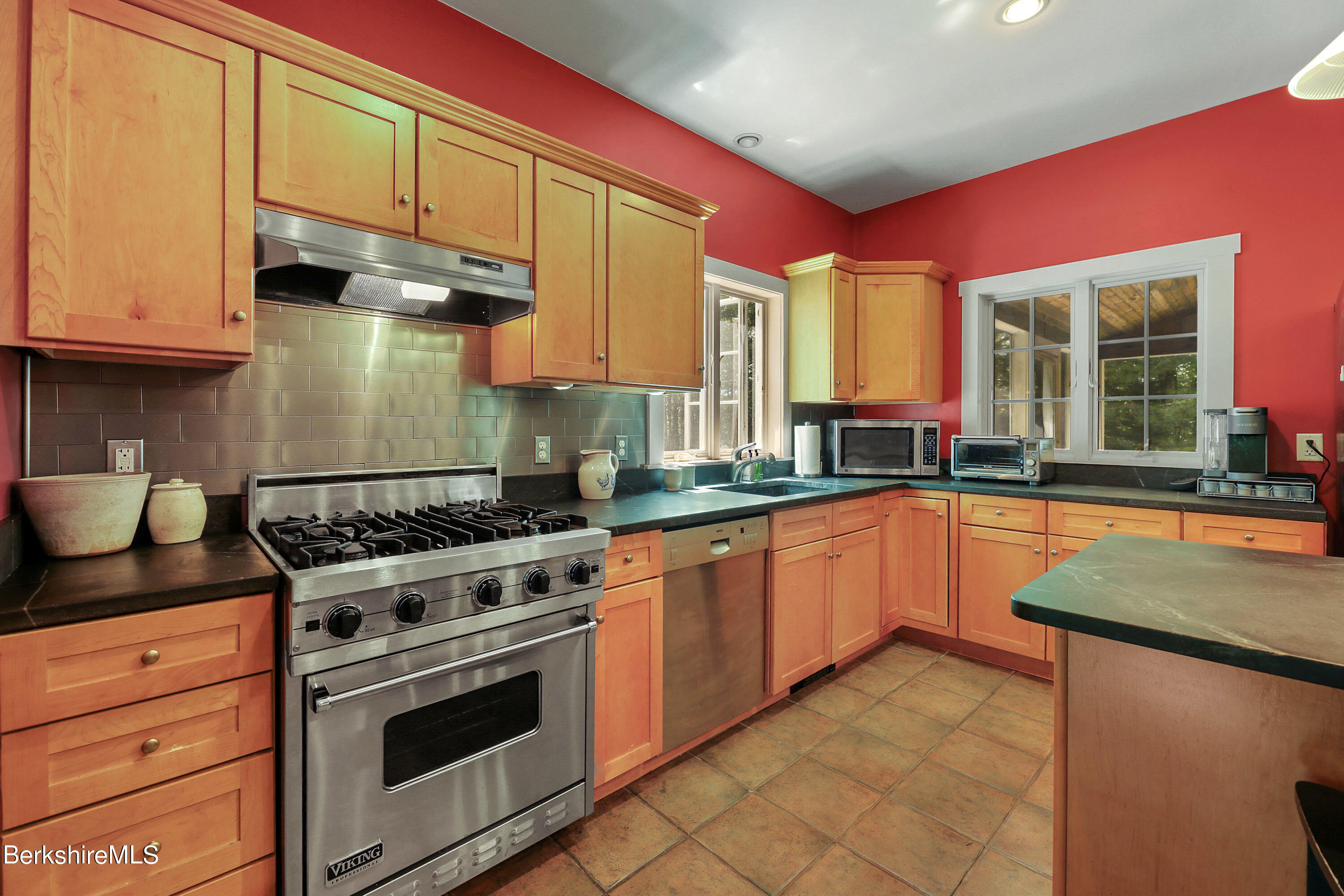 12 Castle Hill Road Stockbridge, MA 01262 - Photo 6 of 39 a kitchen with stainless steel appliances granite countertop a stove a sink and a microwave