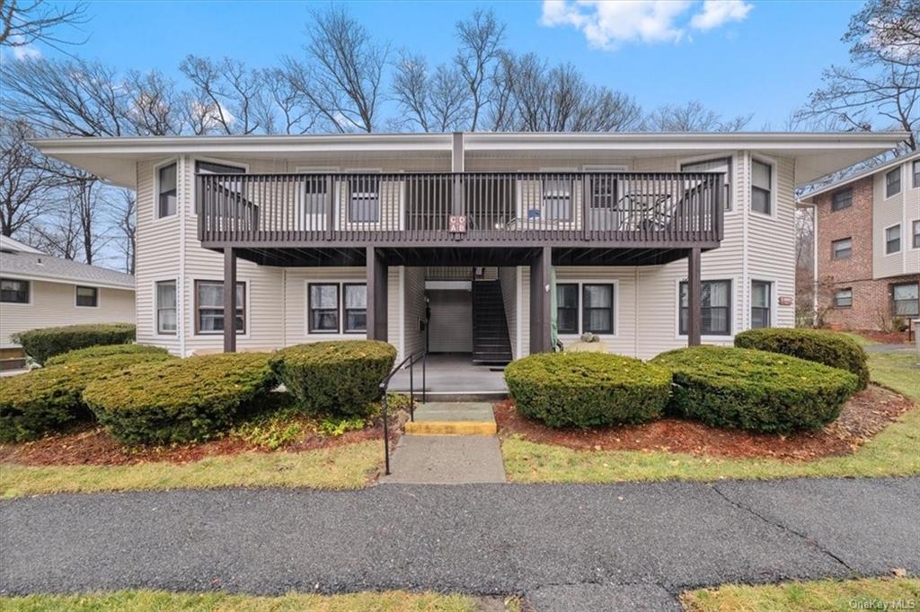 33 Warwick Place, Unit C Yorktown Heights, NY 10598 - Photo 1 of 16 a front view of a house having yard
