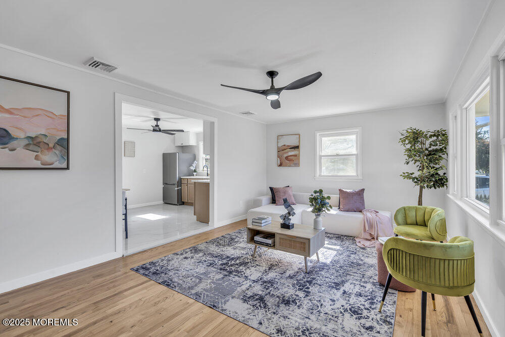 1202 Sunset Avenue Point Pleasant, NJ 08742 - Photo 13 of 23 a living room with furniture and a rug