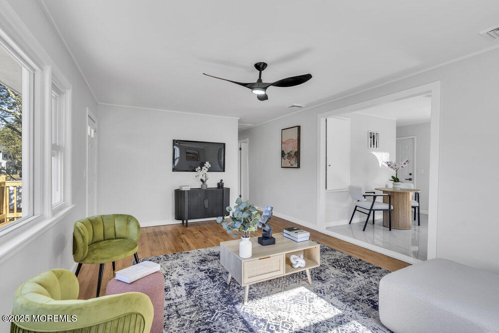 1202 Sunset Avenue Point Pleasant, NJ 08742 - Photo 14 of 23 a living room with furniture and a rug