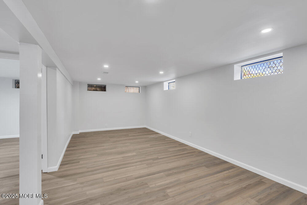 1202 Sunset Avenue Point Pleasant, NJ 08742 - Photo 22 of 23 a view of empty room with wooden floor