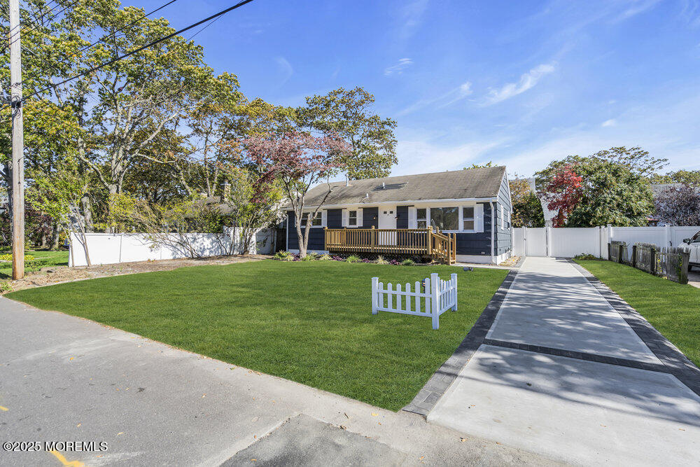1202 Sunset Avenue Point Pleasant, NJ 08742 - Photo 3 of 23 front view of house with a yard