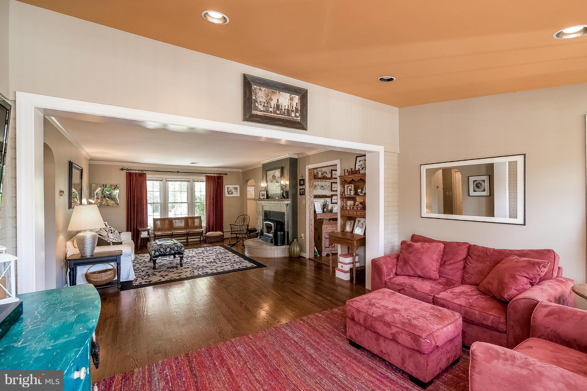 7707 Ridge Road Frederick, MD 21702 - Photo 12 of 30 a living room with furniture and wooden floor