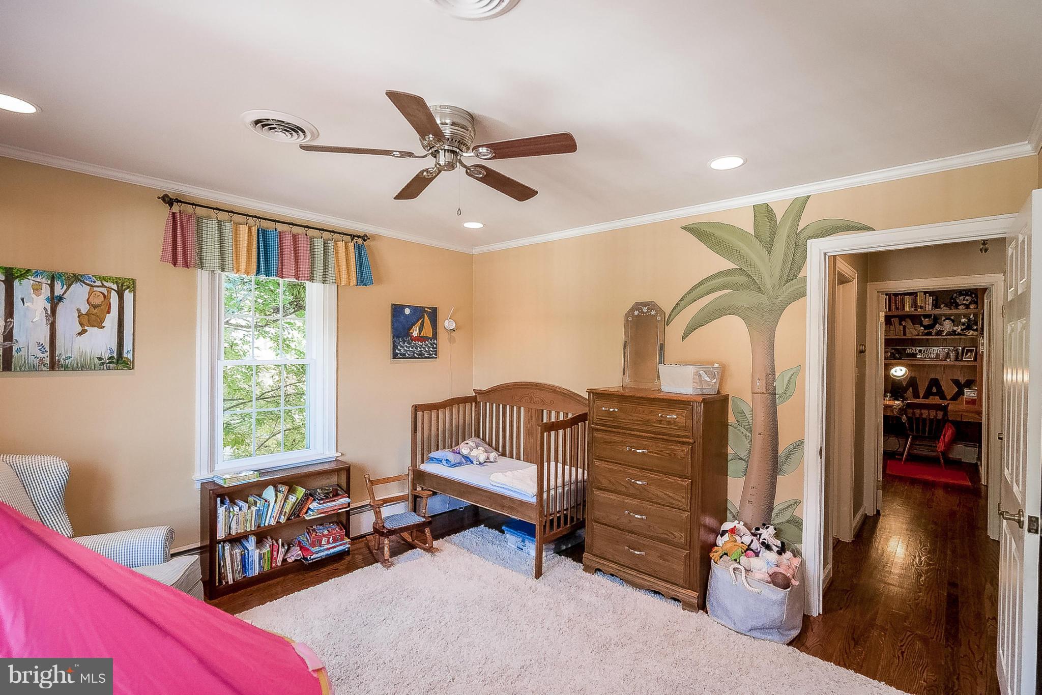 7707 Ridge Road Frederick, MD 21702 - Photo 15 of 30 a bedroom with furniture and a window