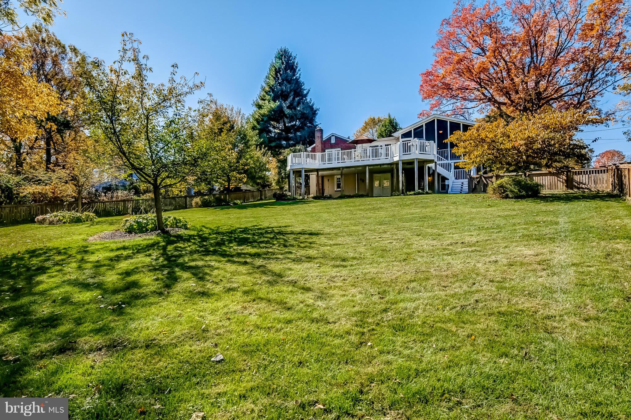 7707 Ridge Road Frederick, MD 21702 - Photo 29 of 30 a view of a house with a big yard and large trees