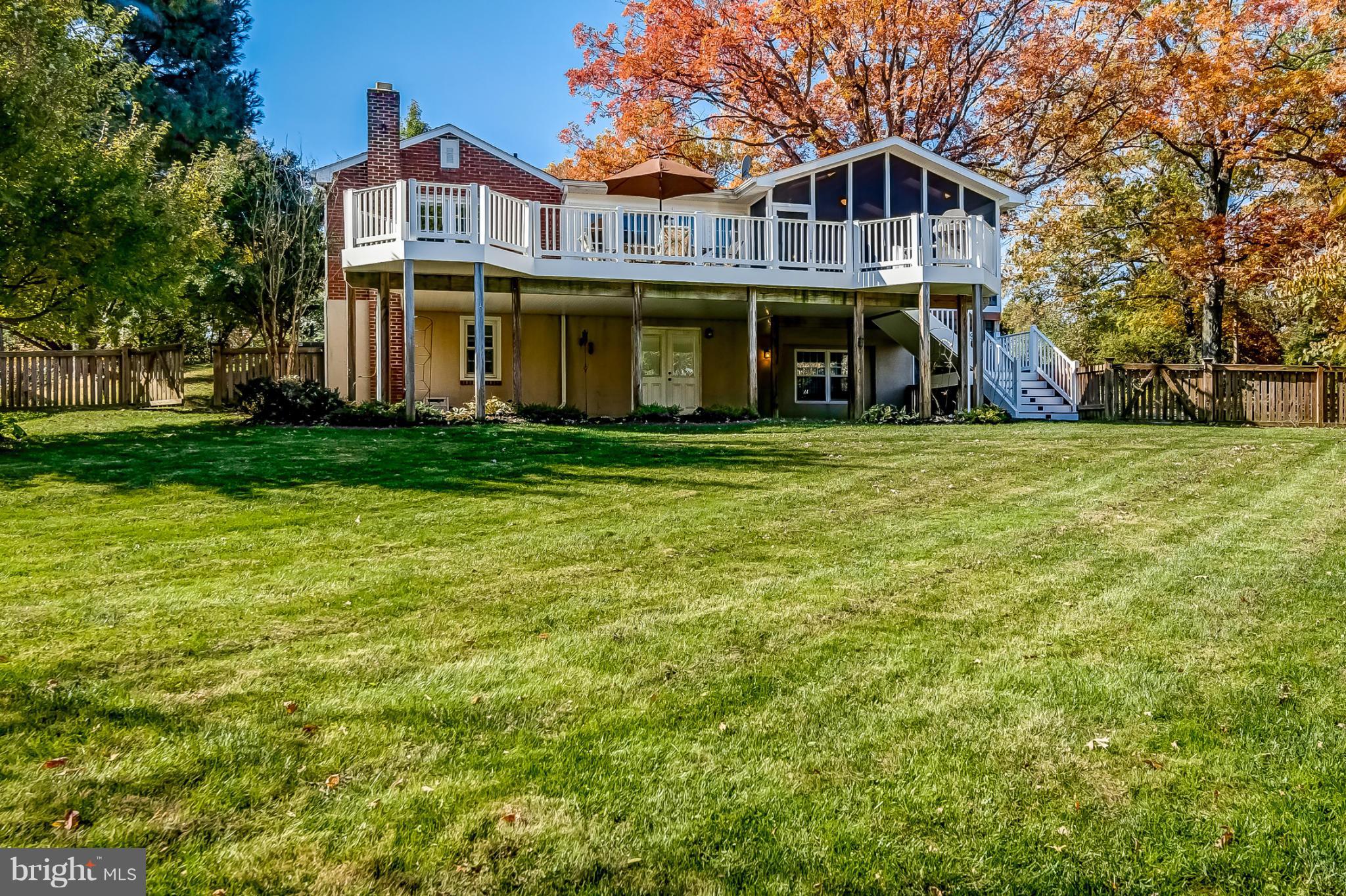 7707 Ridge Road Frederick, MD 21702 - Photo 30 of 30 a front view of a house with a garden