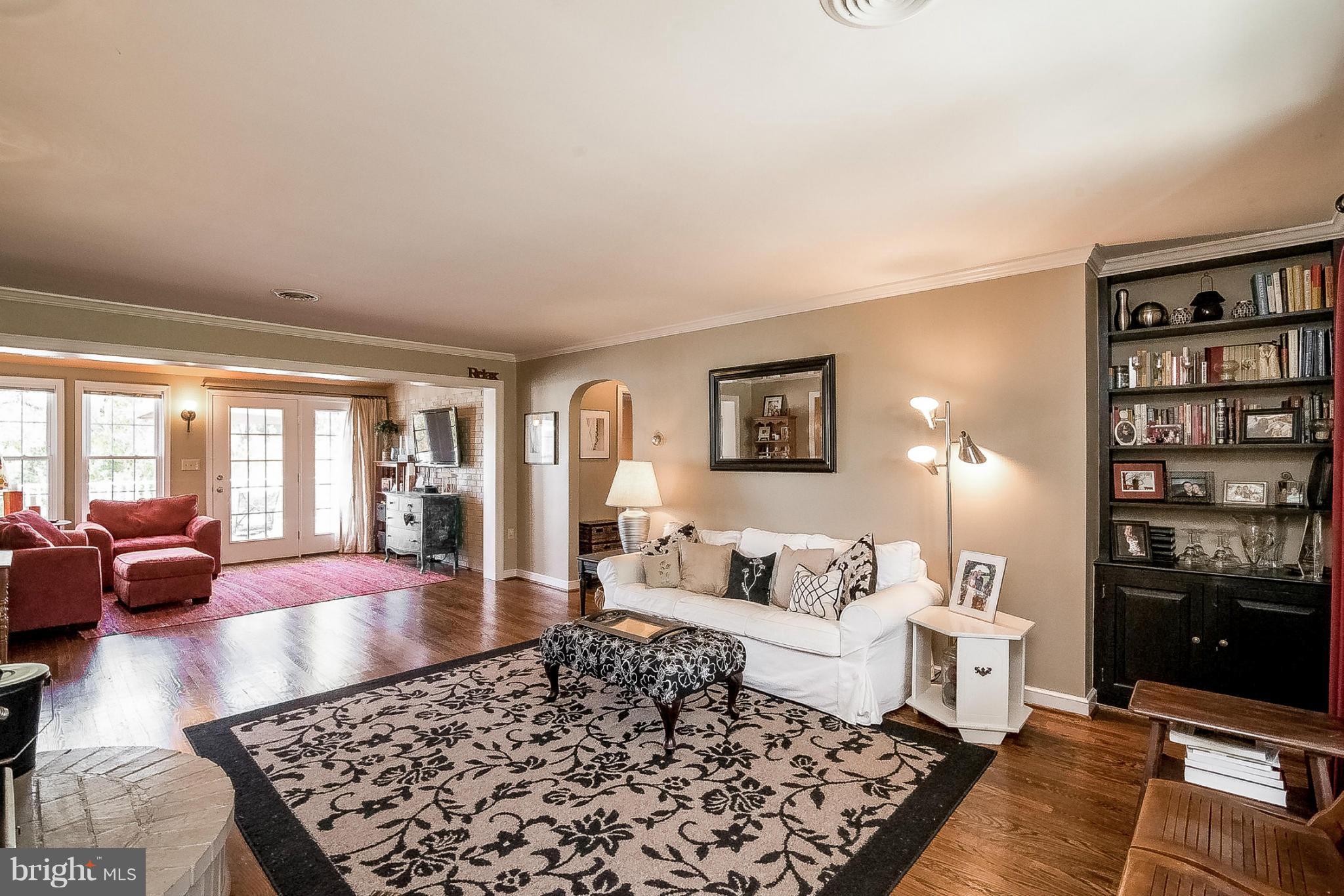7707 Ridge Road Frederick, MD 21702 - Photo 9 of 30 a bedroom with furniture and a rug