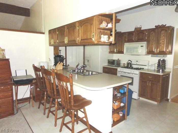 36490 Aurensen Road North Ridgeville, OH 44039 - Photo 7 of 24 An extra 3 seat breakfast bar too!