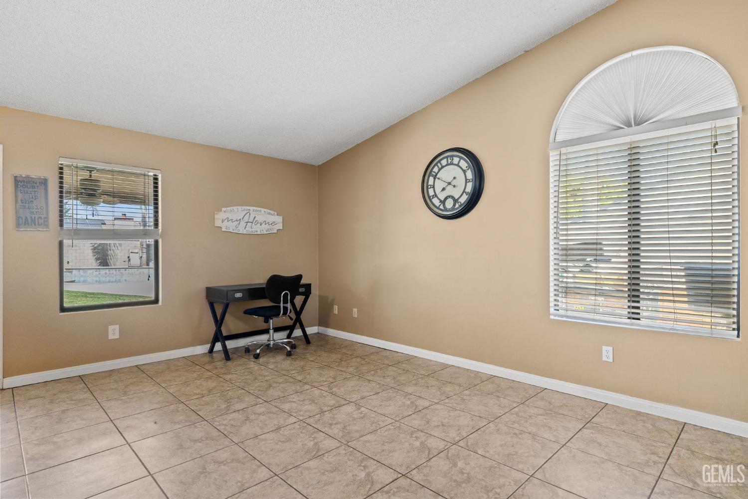 Undisclosed Address Bakersfield, CA 93311 - Photo 12 of 40 a view of a livingroom with furniture and window