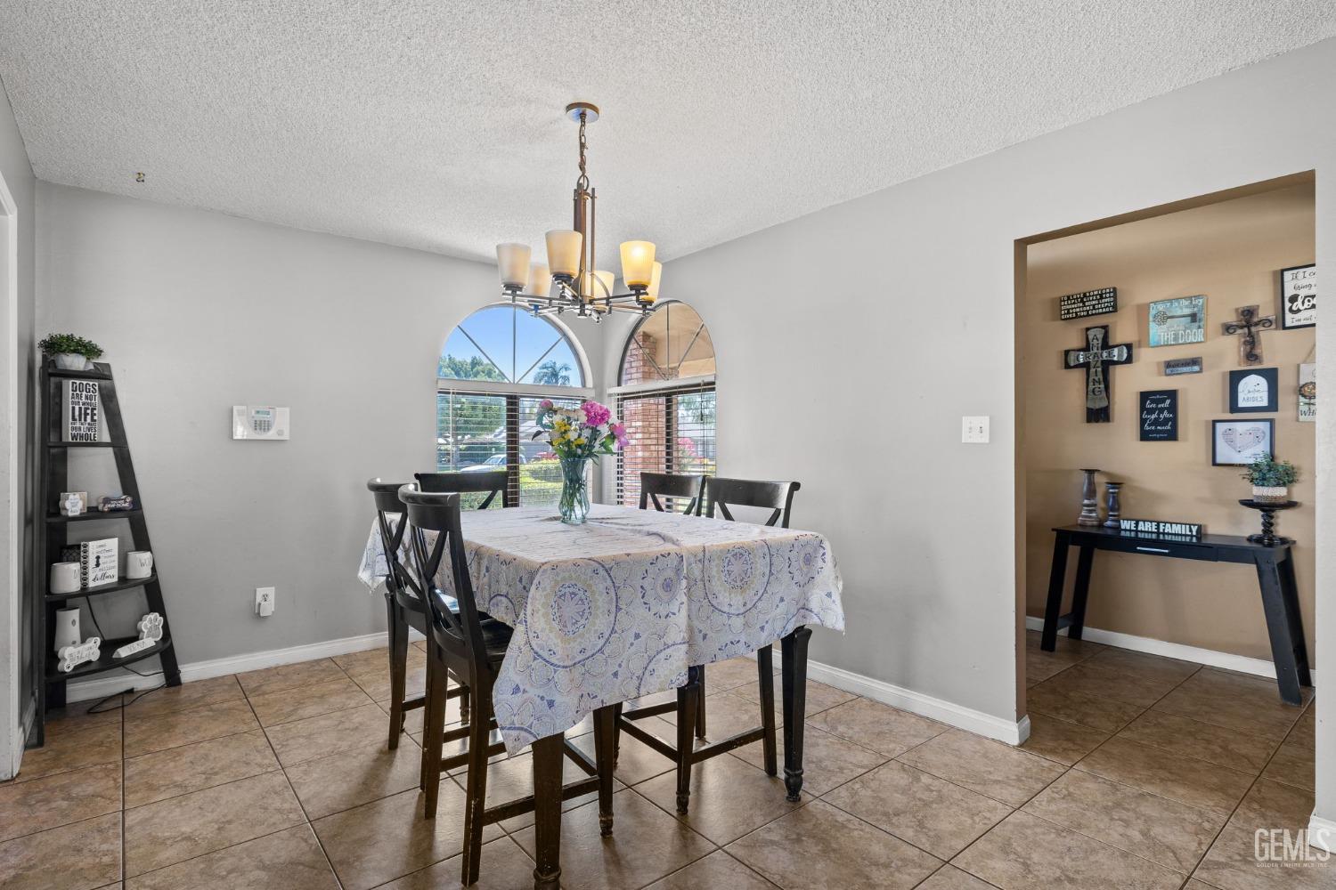 Undisclosed Address Bakersfield, CA 93311 - Photo 22 of 40 a view of a dining room and a livingroom
