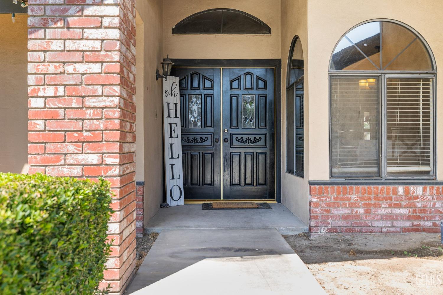 Undisclosed Address Bakersfield, CA 93311 - Photo 4 of 40 a front view of a house with a yard