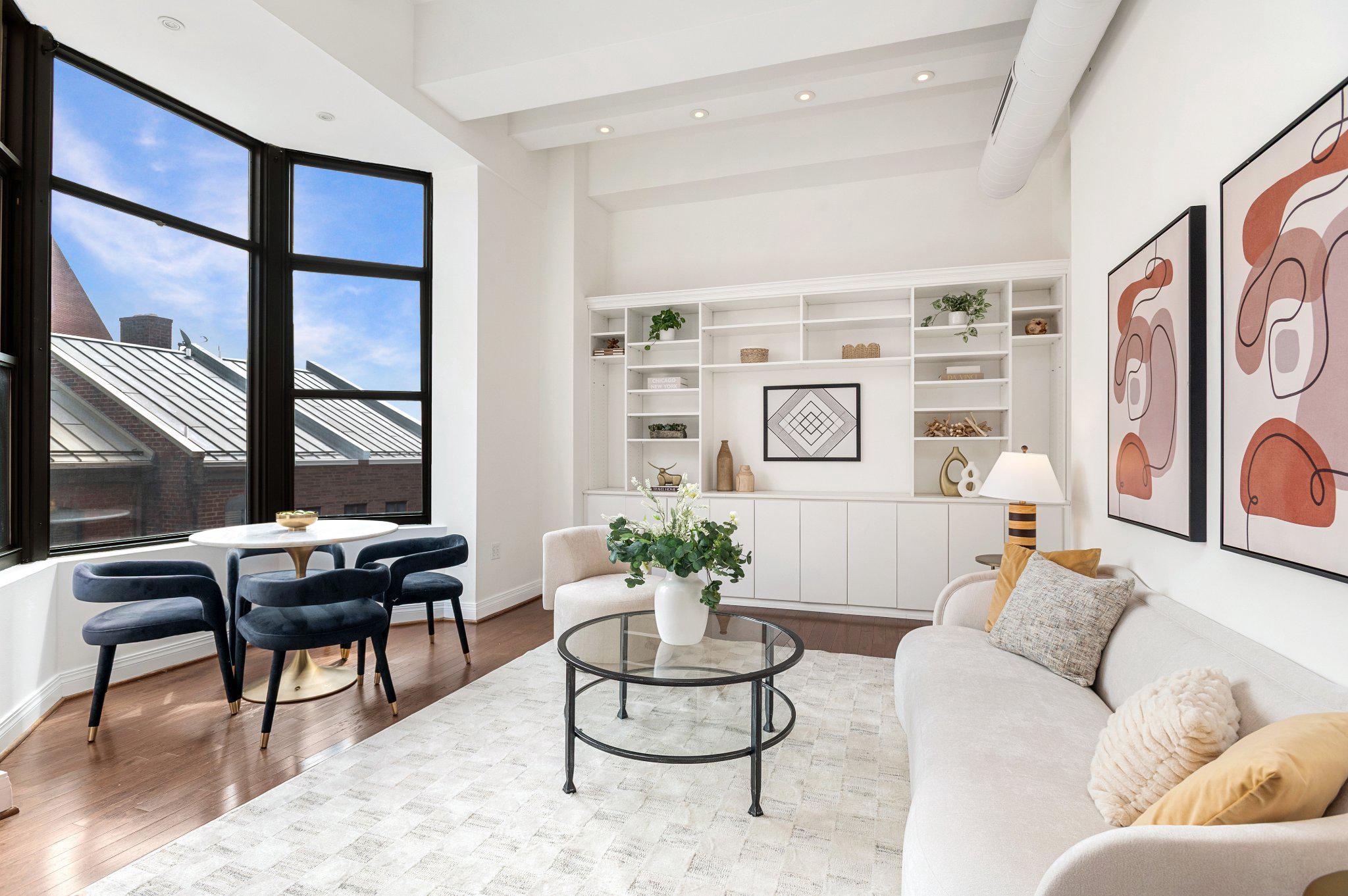 3299 K Street Northwest, Unit 401 Washington, DC 20007 - Photo 3 of 18 a living room with furniture and large windows