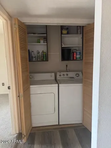 a utility room with dryer and washer