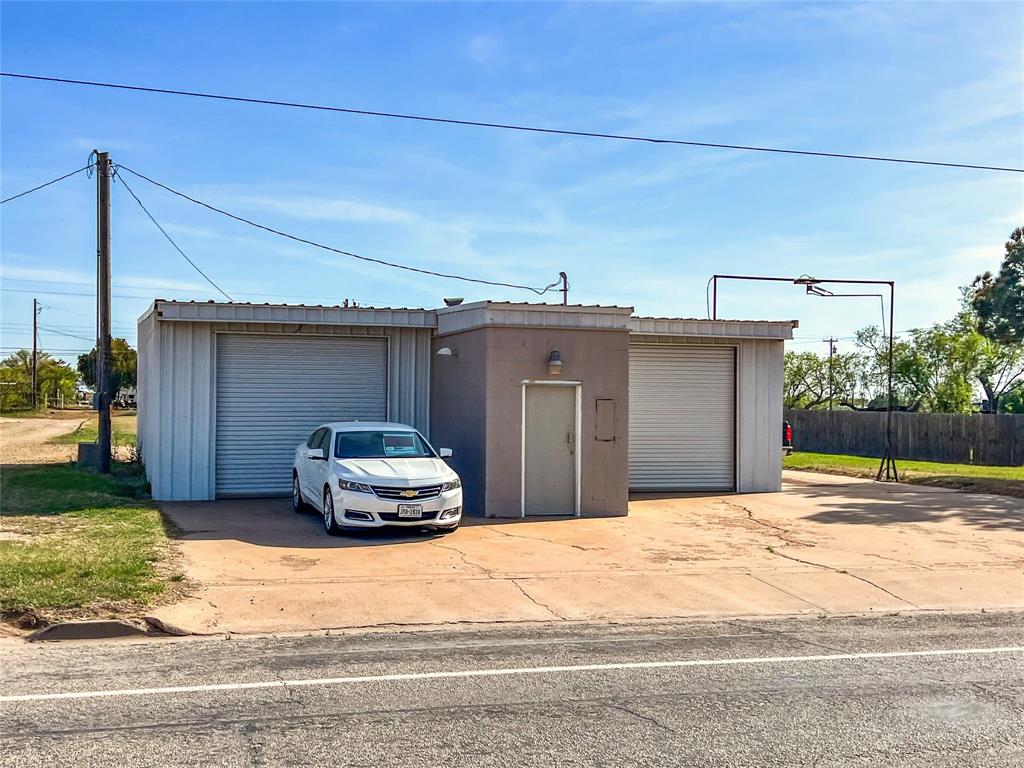 704 North 1st Street Haskell, TX 79521 - Photo 2 of 13 a car parked on the side of the road