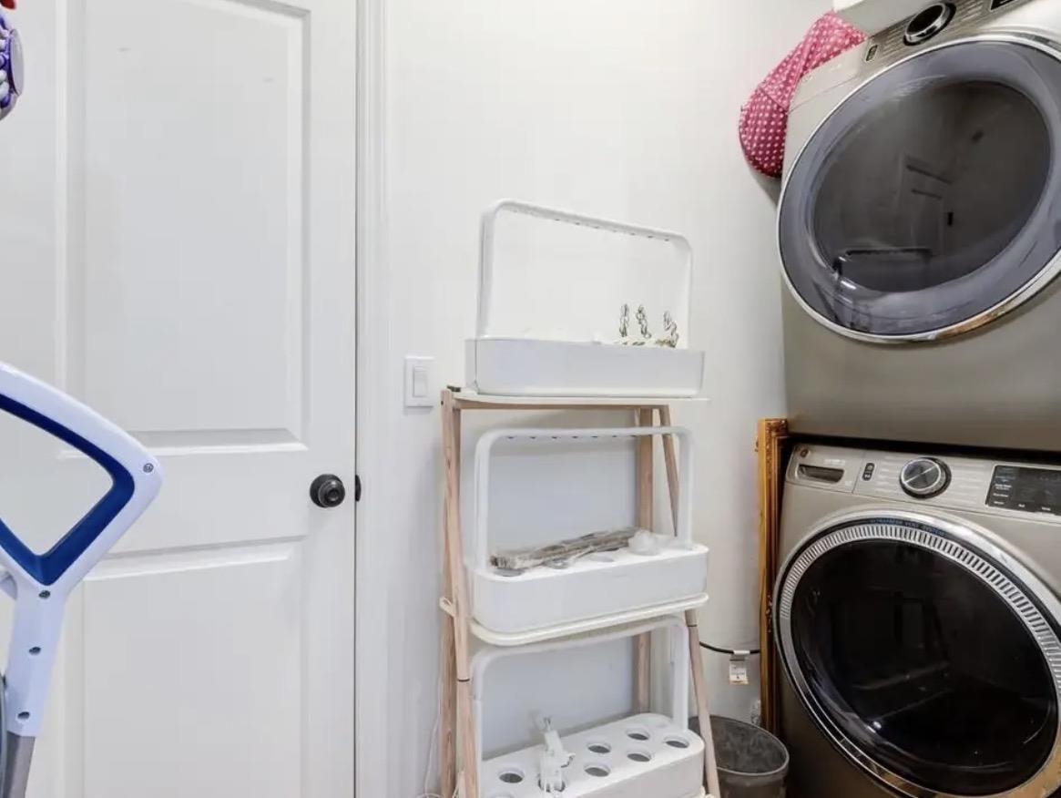 306 Old Bergen Road, Unit 1 Jersey City, NJ 07305 - Photo 8 of 9 a utility room with dryer and washer
