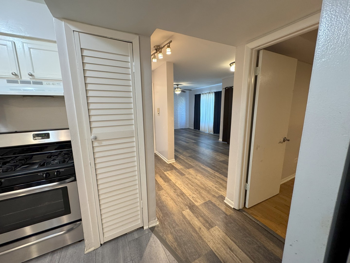 6027 103rd Street, Unit 1A Chicago Ridge, IL 60415 - Photo 16 of 22 a view of a kitchen from the hallway