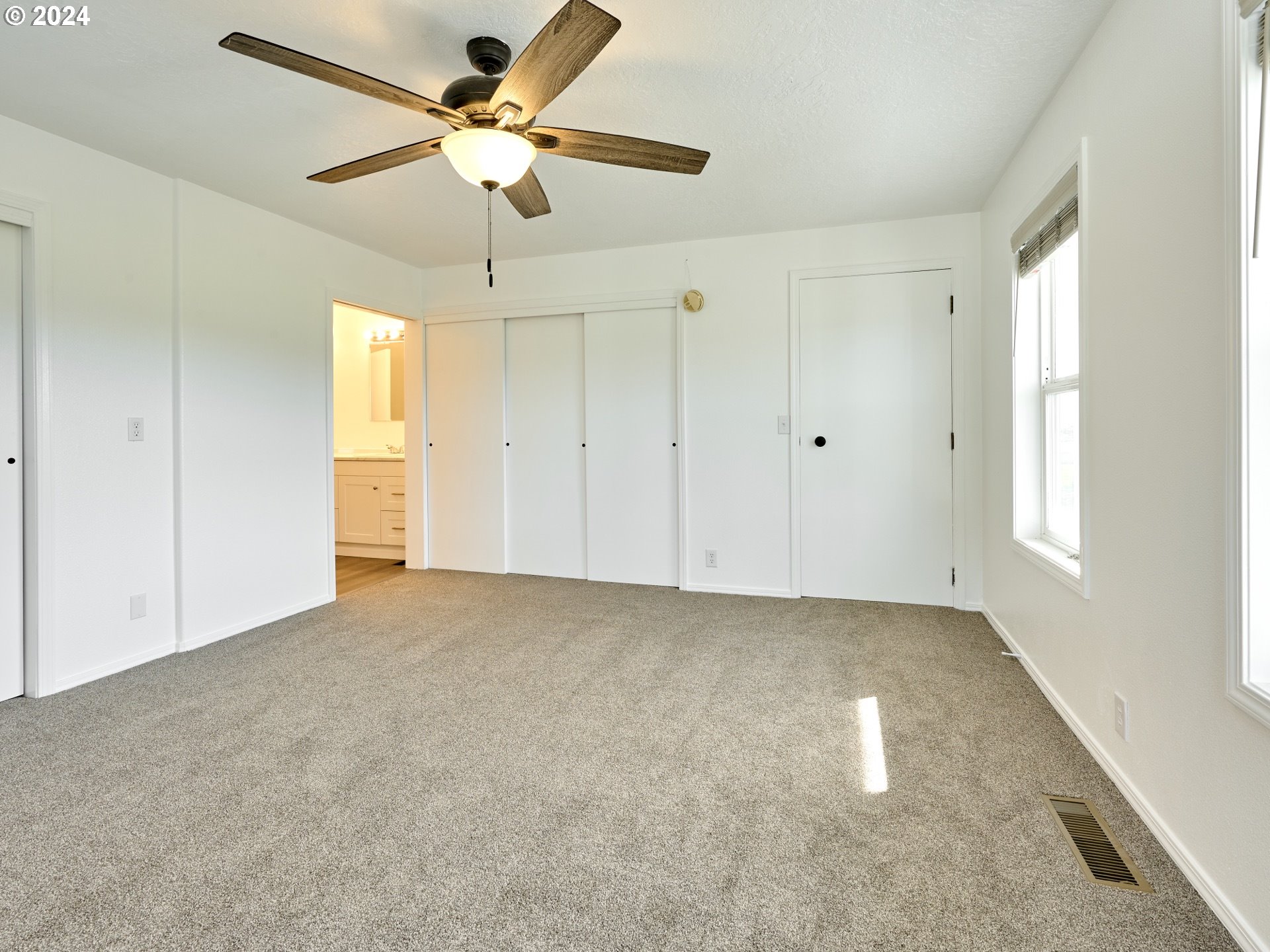 12795 Beck Road Dallas, OR 97338 - Photo 13 of 48 a view of an empty room with a window