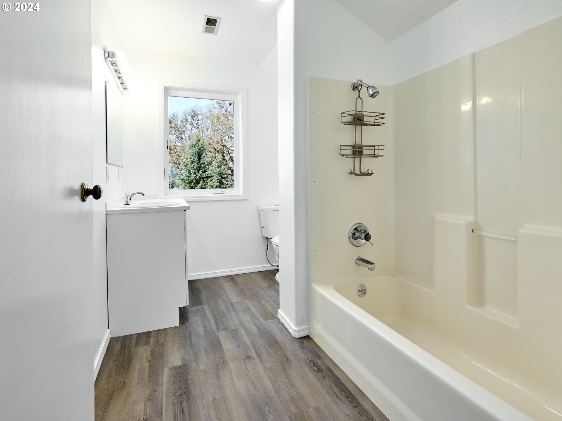 12795 Beck Road Dallas, OR 97338 - Photo 20 of 48 a bathroom with a bathtub and shower