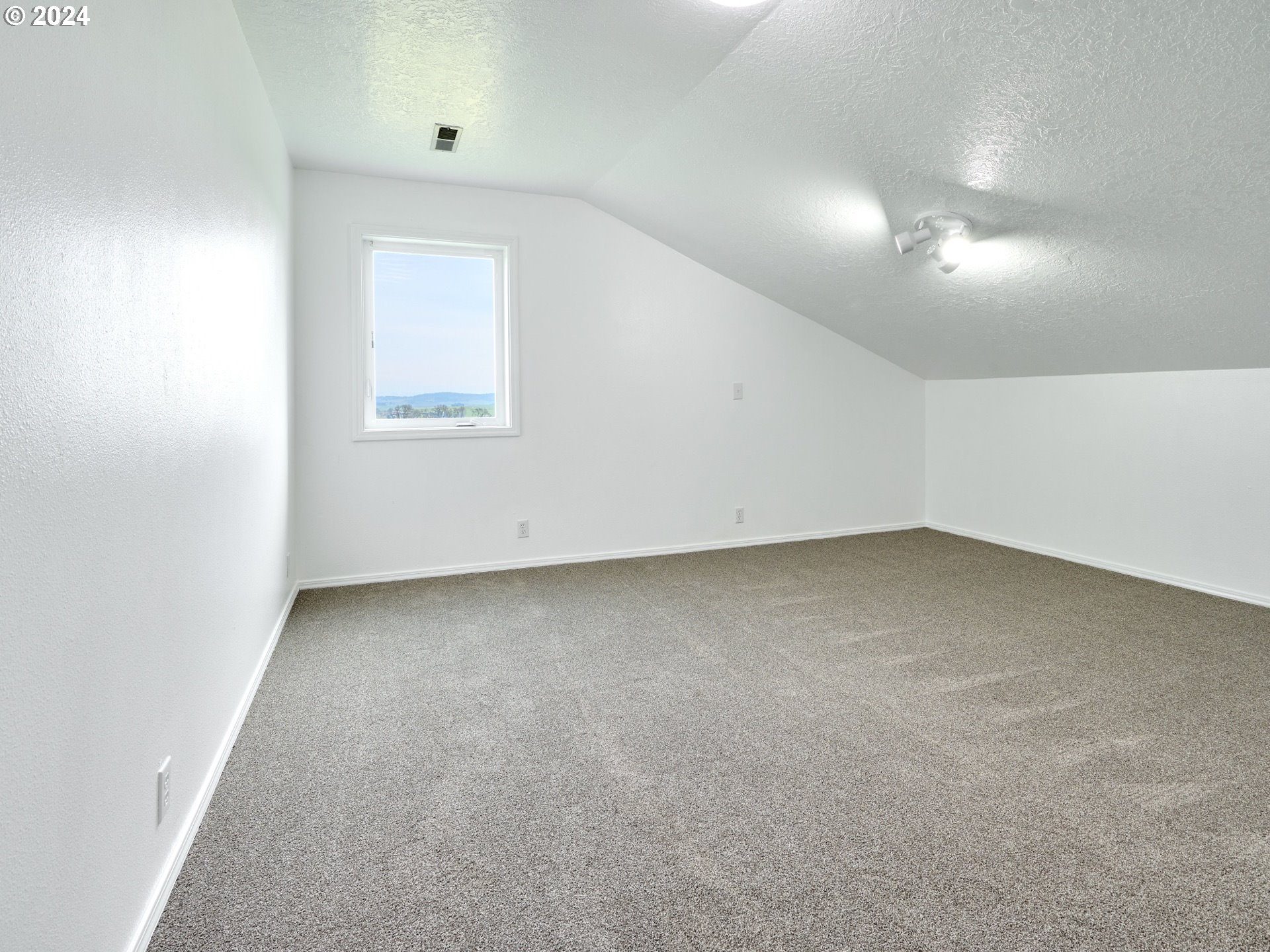 12795 Beck Road Dallas, OR 97338 - Photo 21 of 48 an empty room with a empty space and windows
