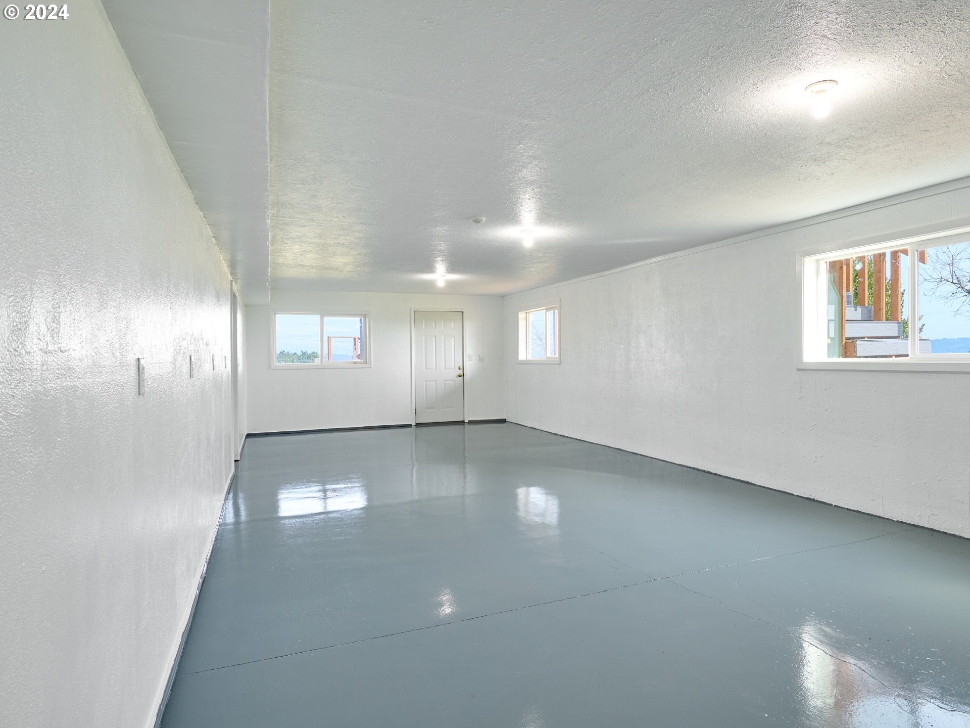 12795 Beck Road Dallas, OR 97338 - Photo 30 of 48 an empty room with windows and yard