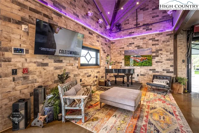 a outdoor living space with lots of furniture and clutter