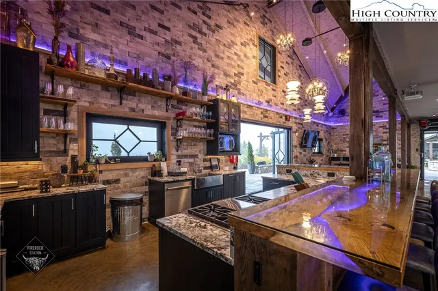 a view of a chairs and table in the patio