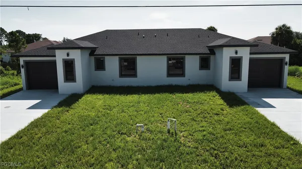 a view of a house with garden