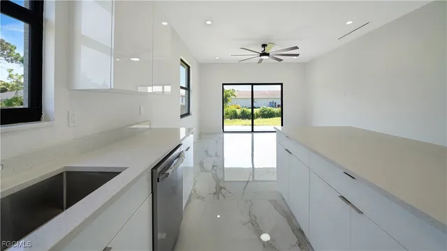 a view of kitchen with furniture and window