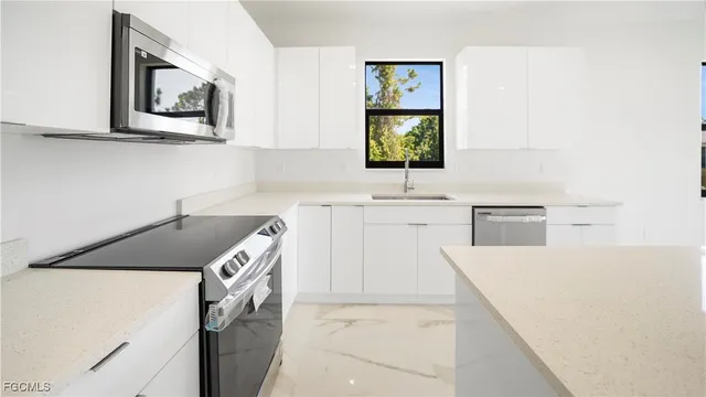 an empty room with glass door and windows