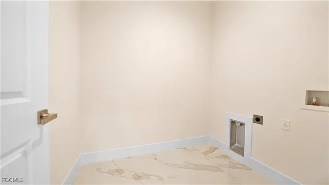 a view of a bathroom from a hallway