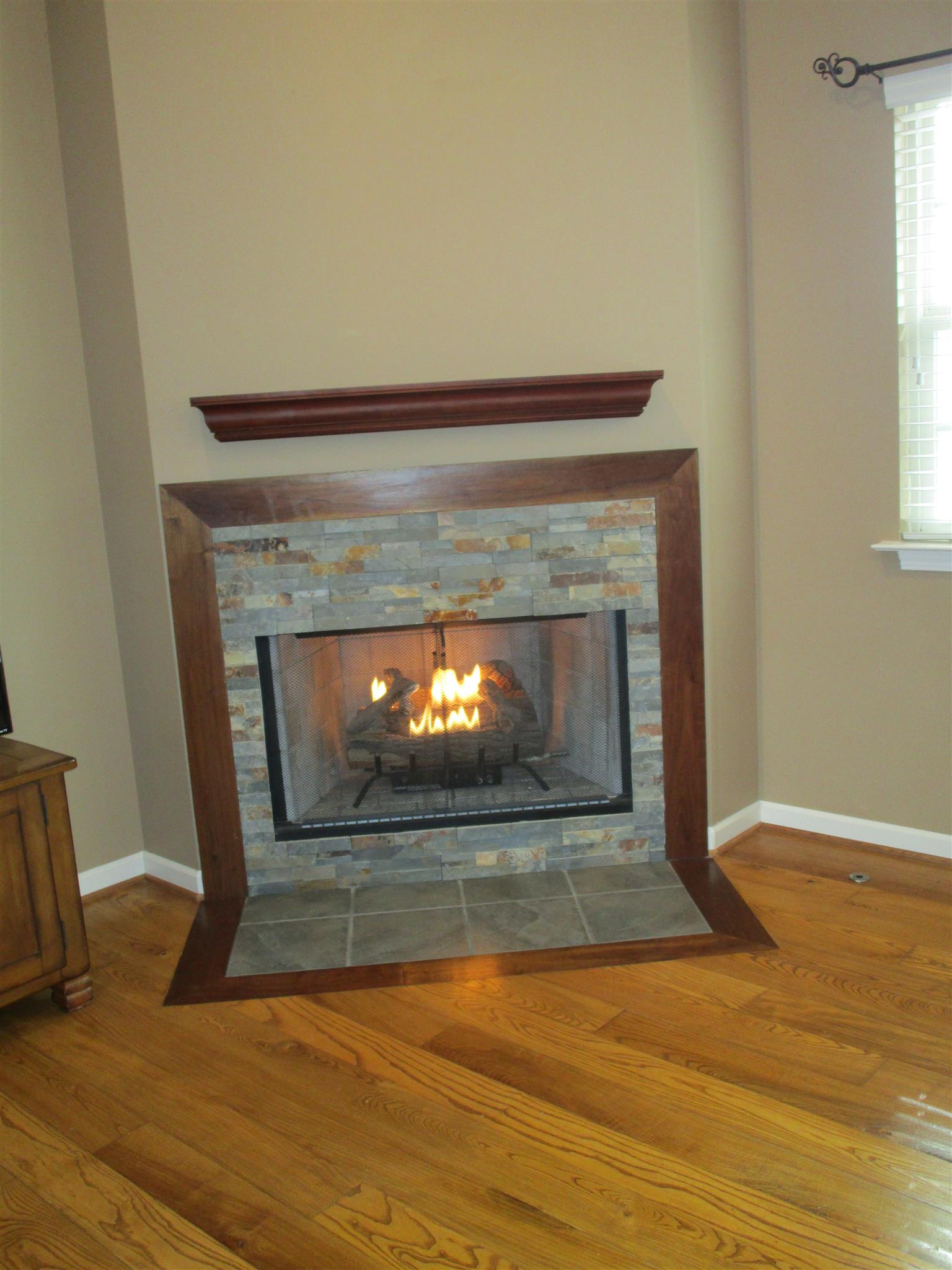 136 North Leath Road Portland, TN 37148 - Photo 16 of 30 a living room with a fireplace