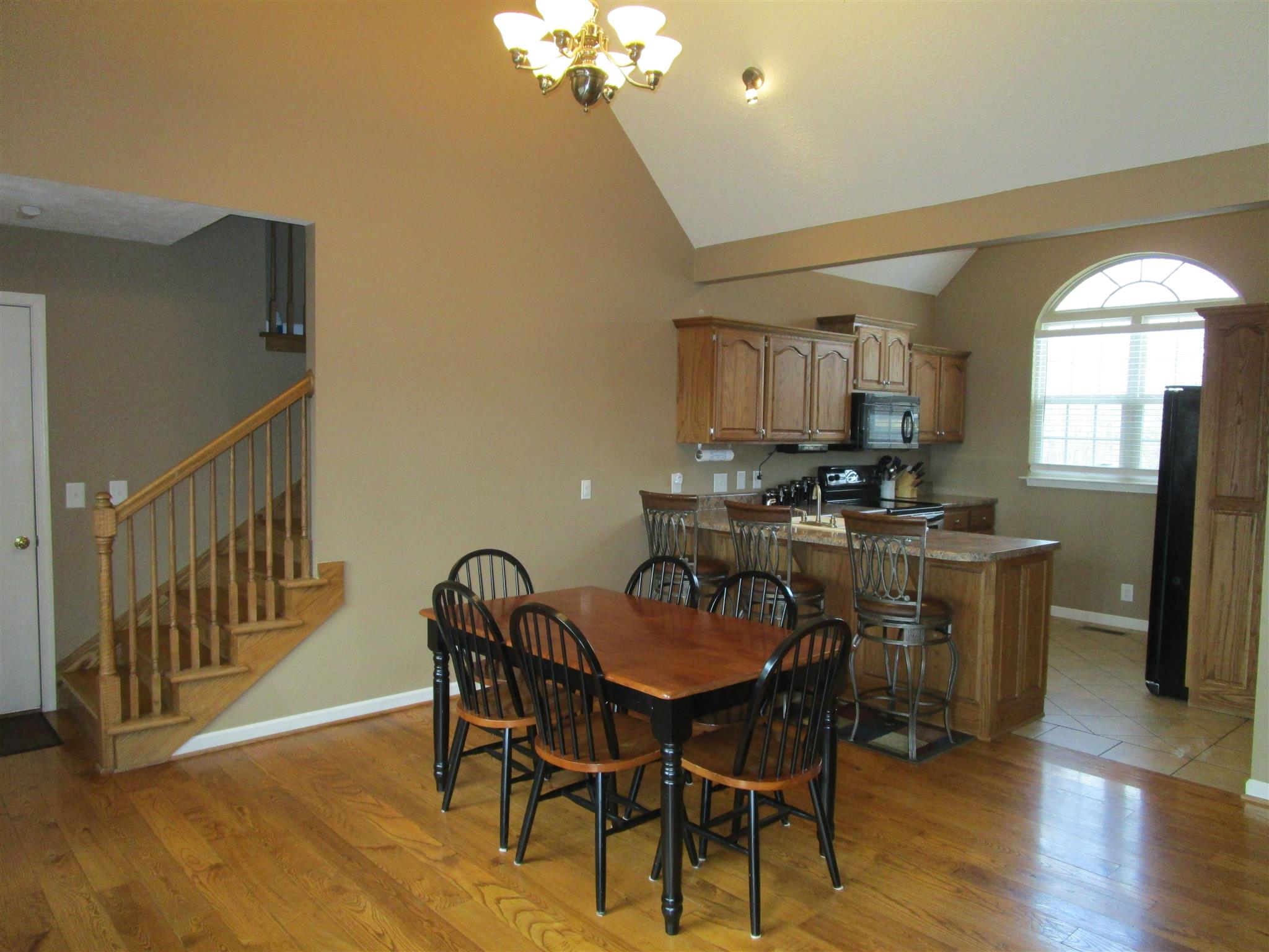 136 North Leath Road Portland, TN 37148 - Photo 17 of 30 a view of a dining room with furniture and wooden floor