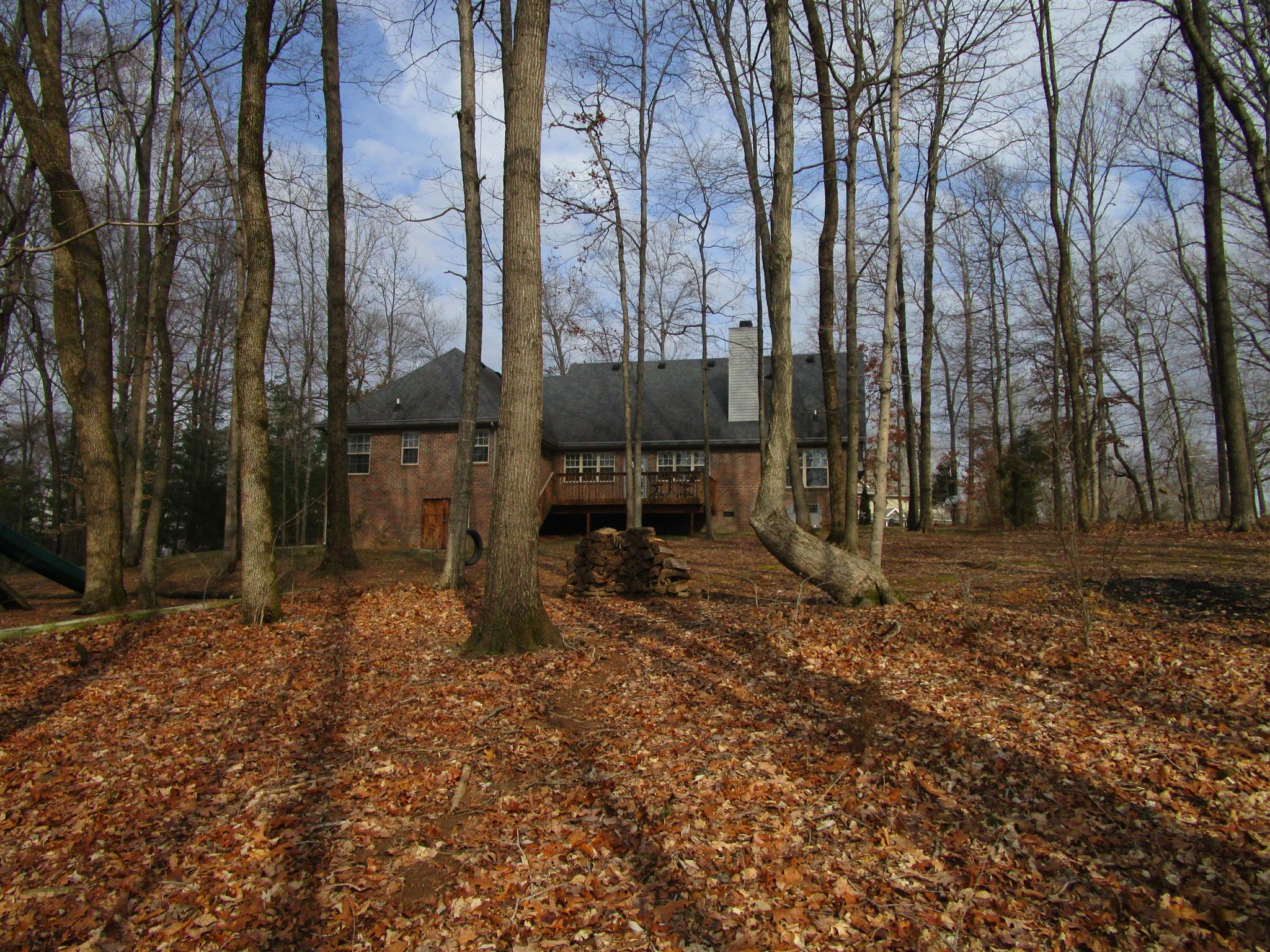 136 North Leath Road Portland, TN 37148 - Photo 5 of 30 a backyard of a house with lots of green space