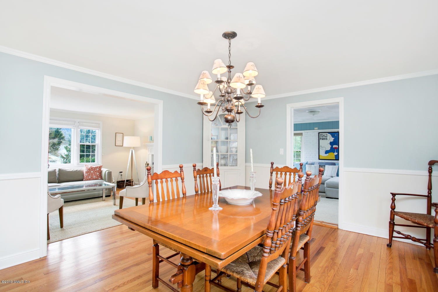 13 Hoover Road Riverside, CT 06878 - Photo 4 of 25 a dining room with furniture a chandelier and wooden floor