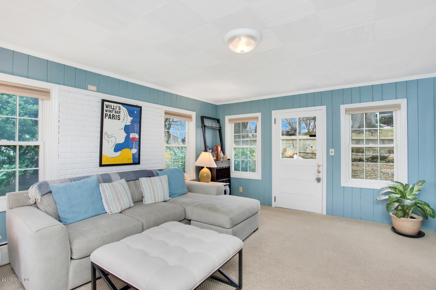 13 Hoover Road Riverside, CT 06878 - Photo 5 of 25 a living room with furniture and painting on the wall